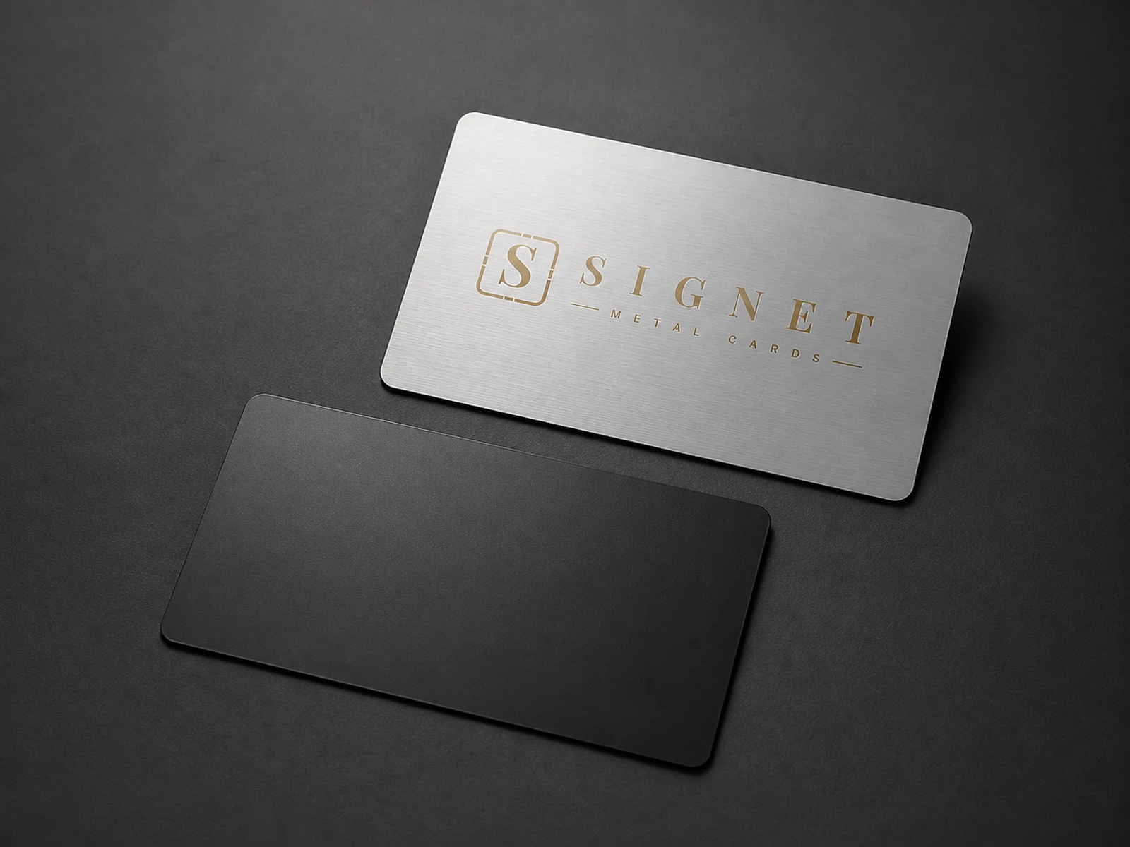 Brushed silver and matte black metal cards showing two distinct surface directions.