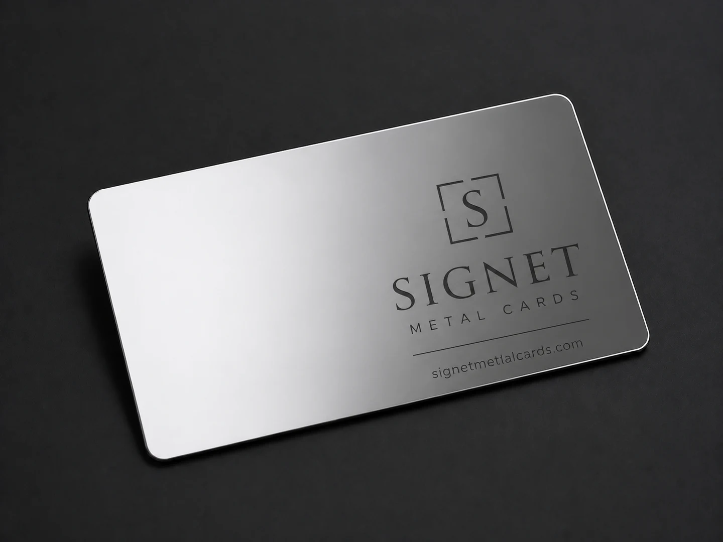 Polished mirror metal business card with controlled reflection and Signet design